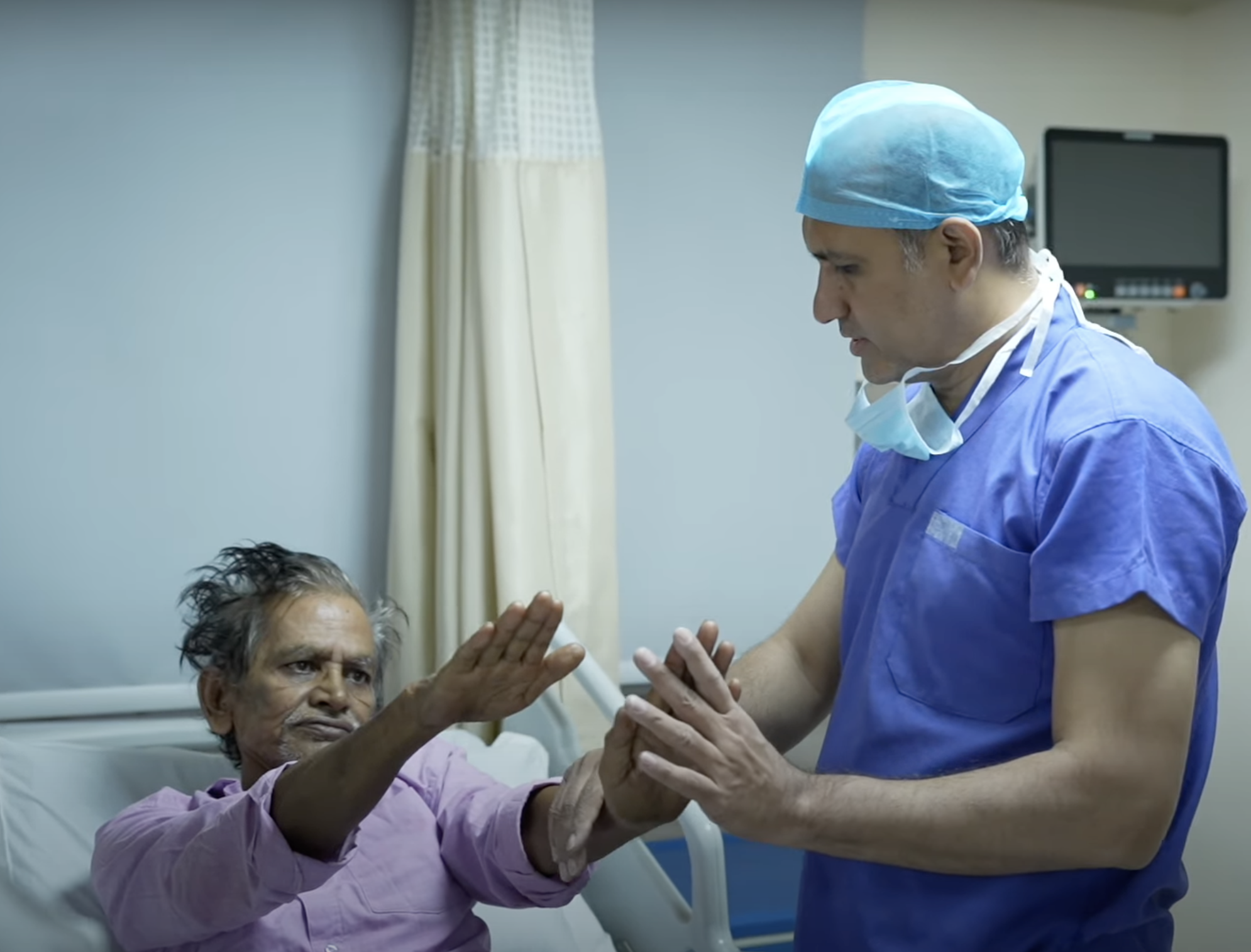 Dr. Zia providing compassionate patient care